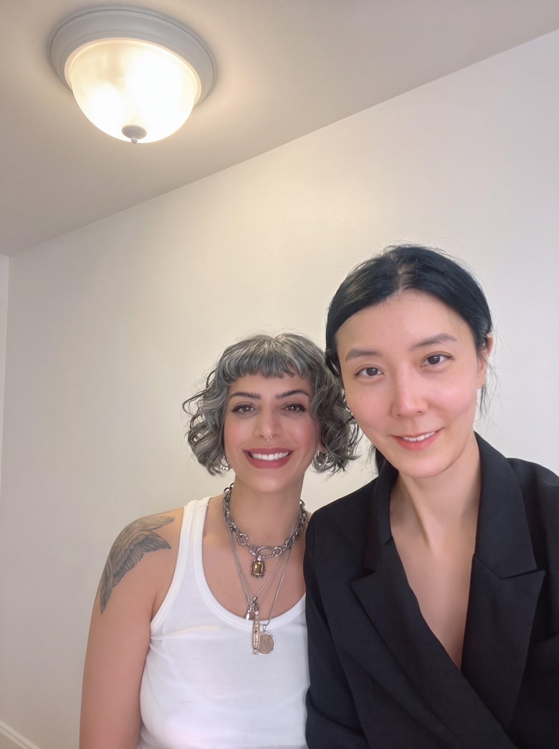Ranin with artist after Thick Hybrid Cat Eye appointment at Tall & Great